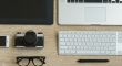top-view-of-business-workplace-with-laptop-and-gadgets.jpg